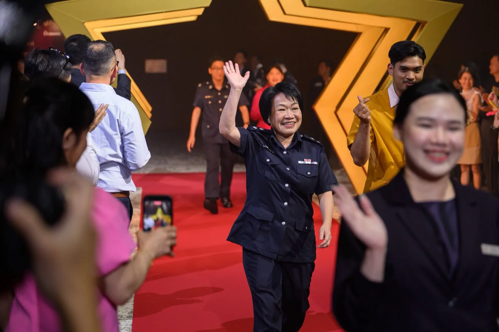 Guest arriving along the AAC 2026 red carpet