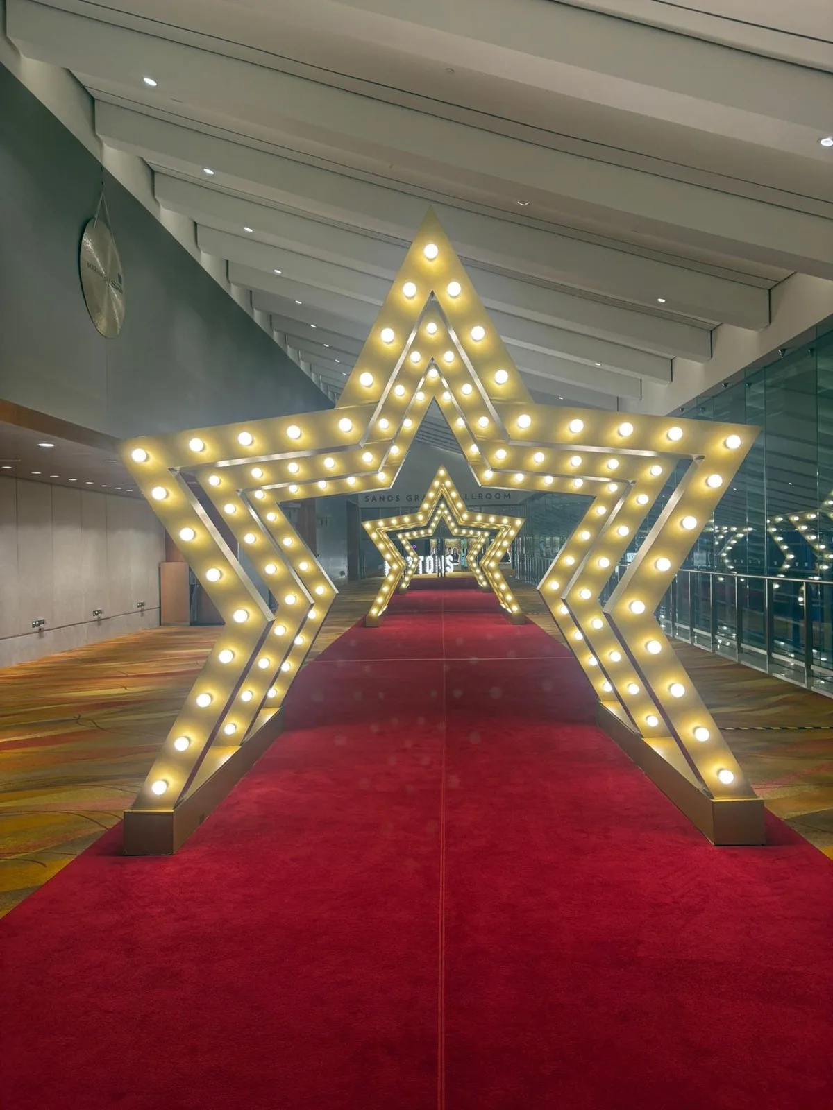 Illuminated star arches over the Huttons Gala Awards red carpet