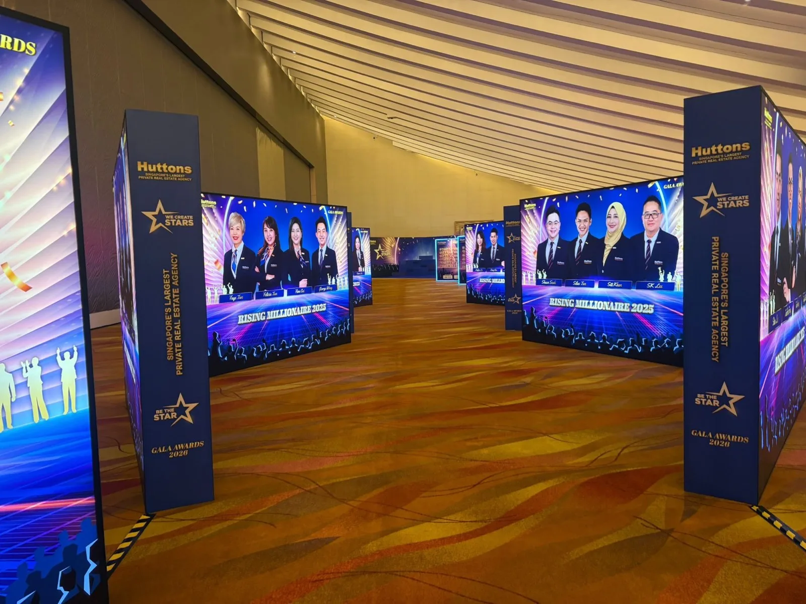 Rows of illuminated Huttons award recipient displays