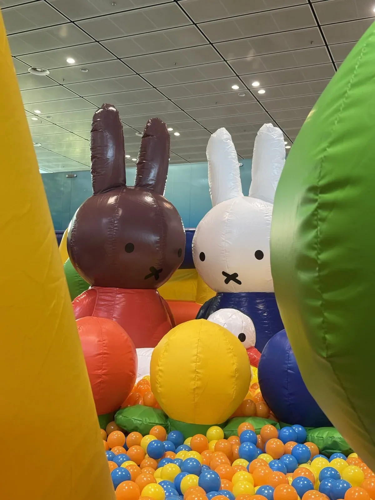 Miffy characters within the colourful inflatable playground
